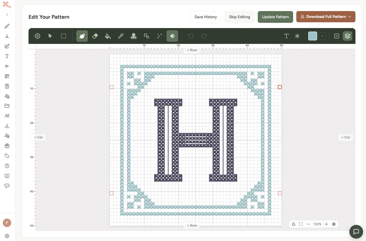 A single-initial cross stitch monogram inside the Xstitchify pattern editor - a bold dark blue letter H centred on a counted grid, framed by a symmetric square teal border with X-stitch corner motifs